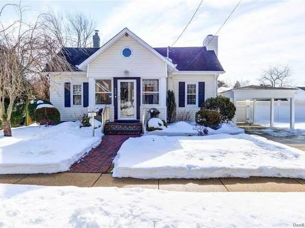 Slide of Nassau Roofing Experts