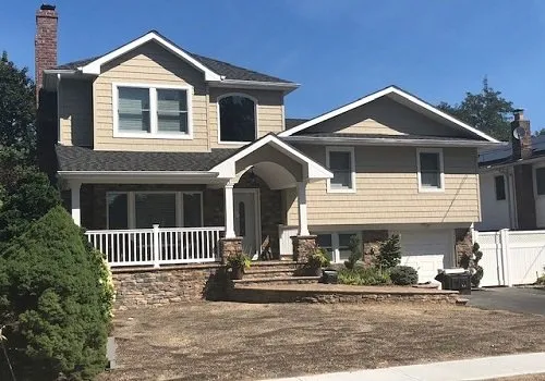 Slide of Nassaus Best Roofers