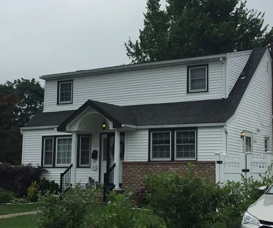 Slide of Nassaus Best Roofers