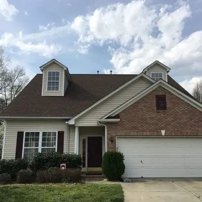 Slide of Nassaus Best Roofers