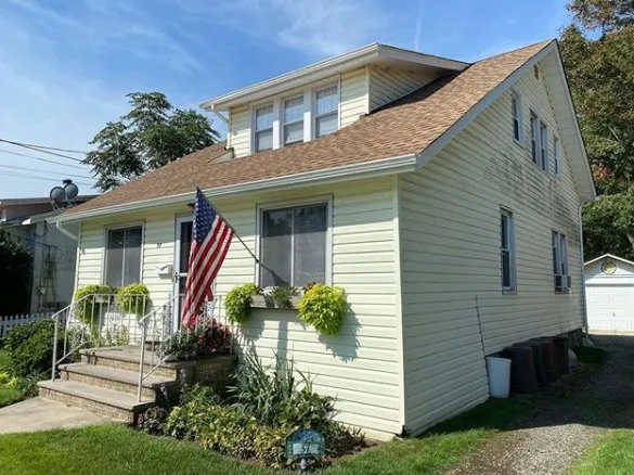 Slide of Nassaus Best Roofers