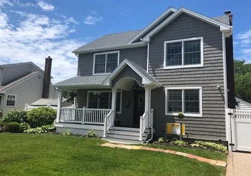 Slide of Nassaus Best Roofers