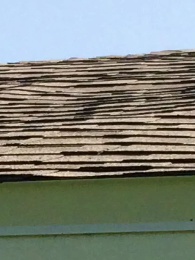 Slide of Nastar Roofing