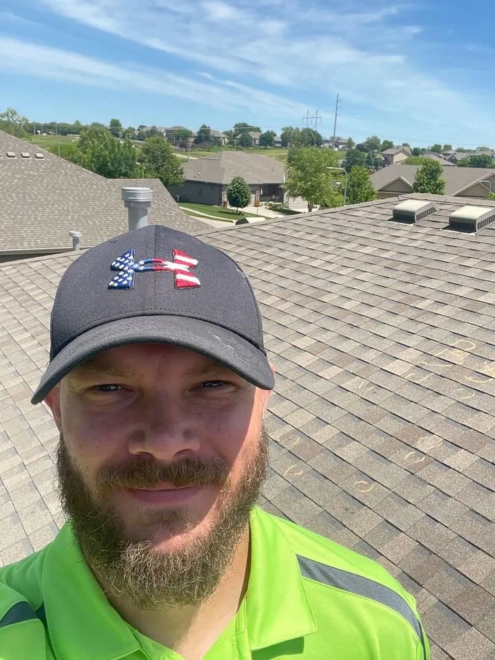 Slide of Nate the Roof Guy