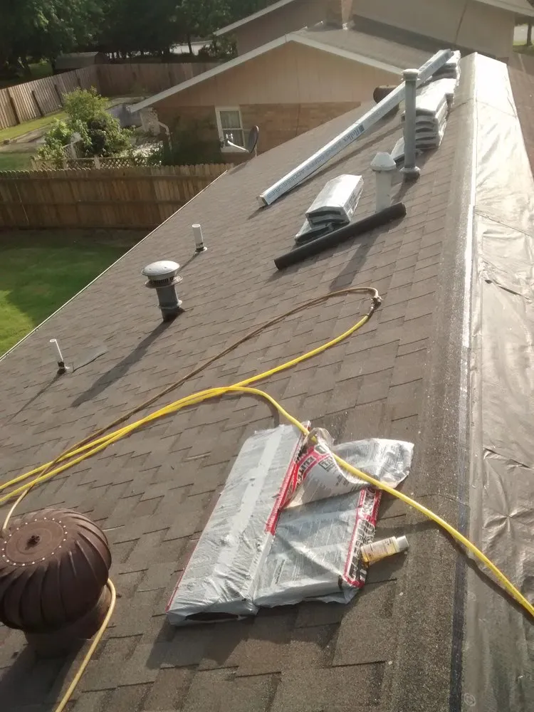 Slide of Nate's Roofing Services