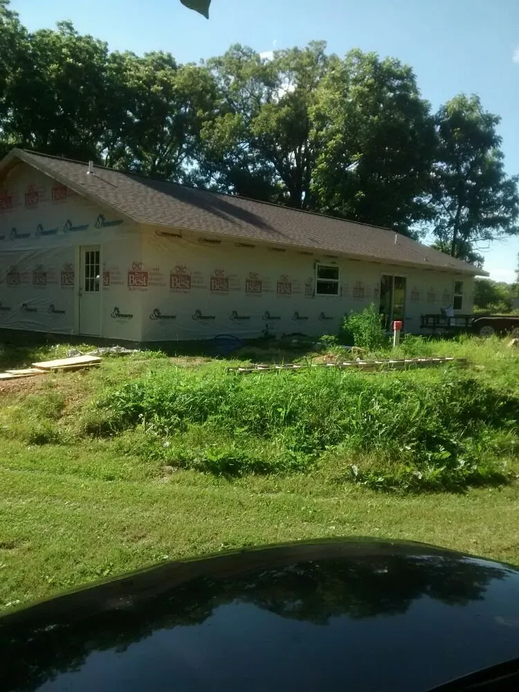 Slide of Nate's Roofing Services