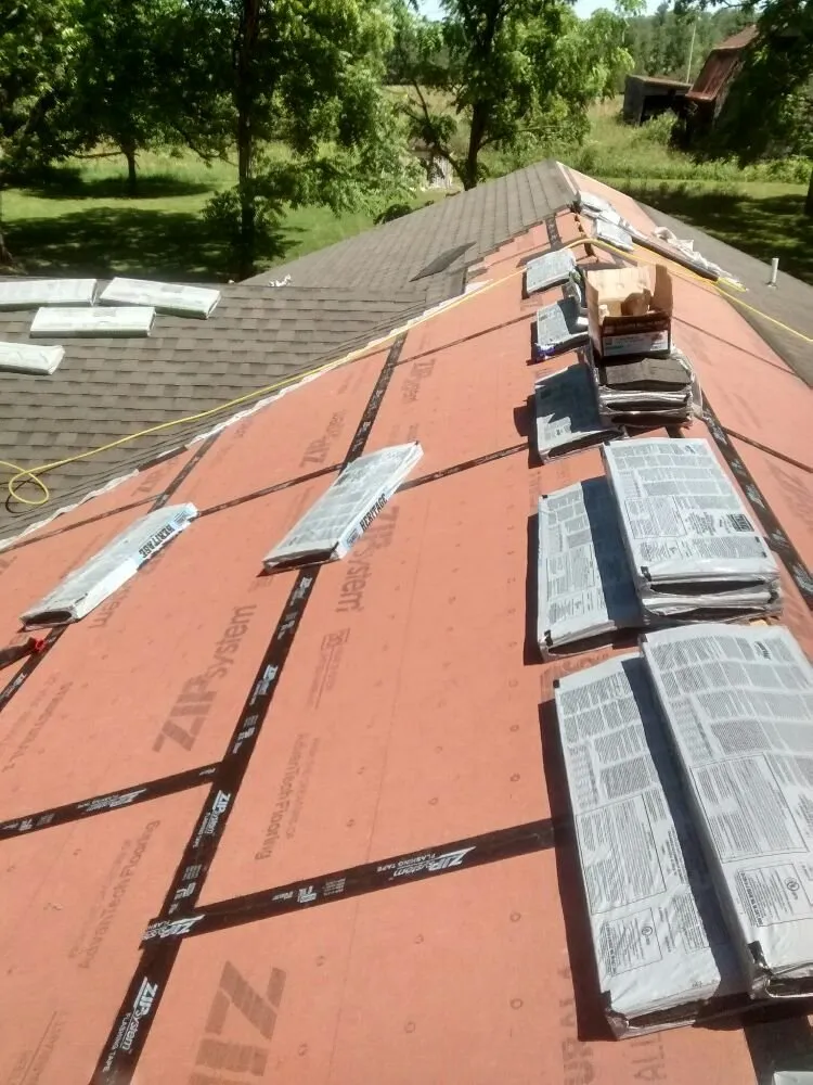 Slide of Nate's Roofing Services