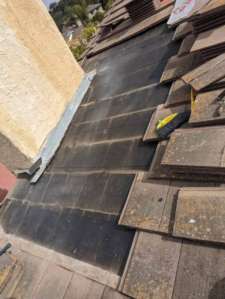 Slide of Nathan Roofing