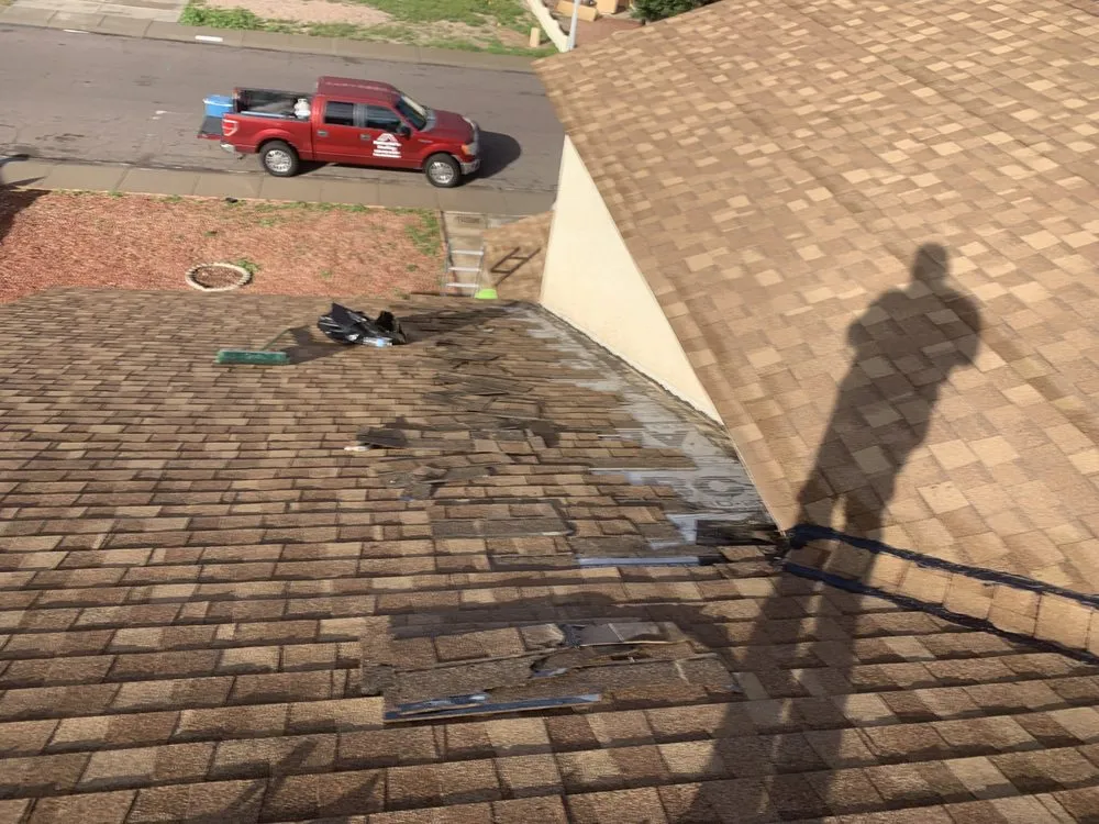 Slide of Nathaniels Roofing