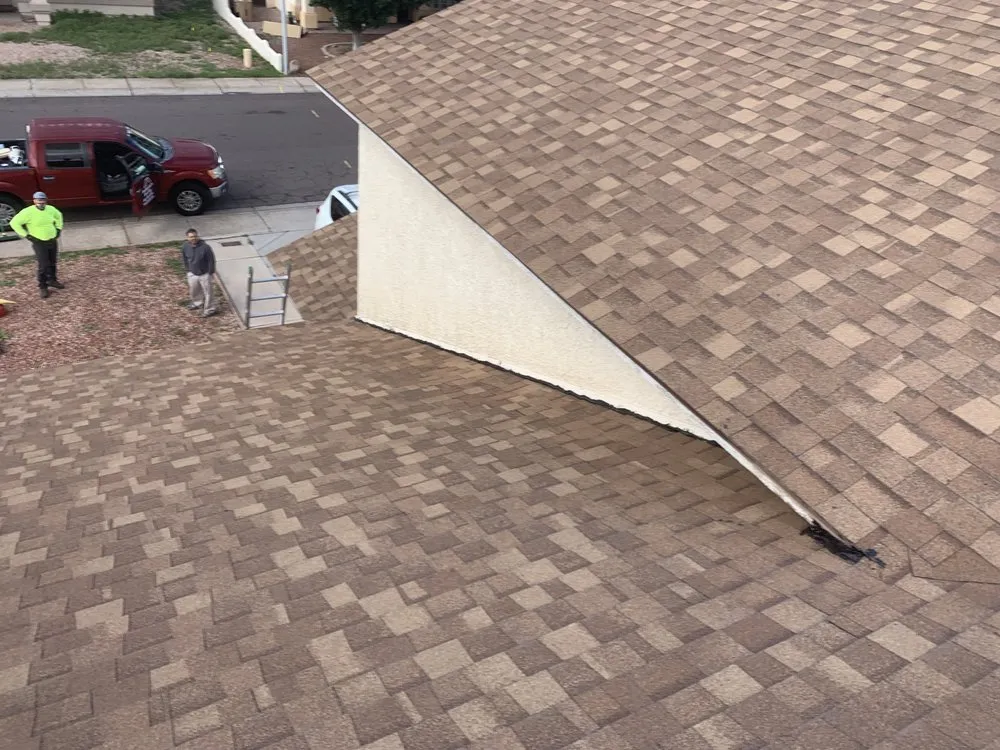 Slide of Nathaniels Roofing