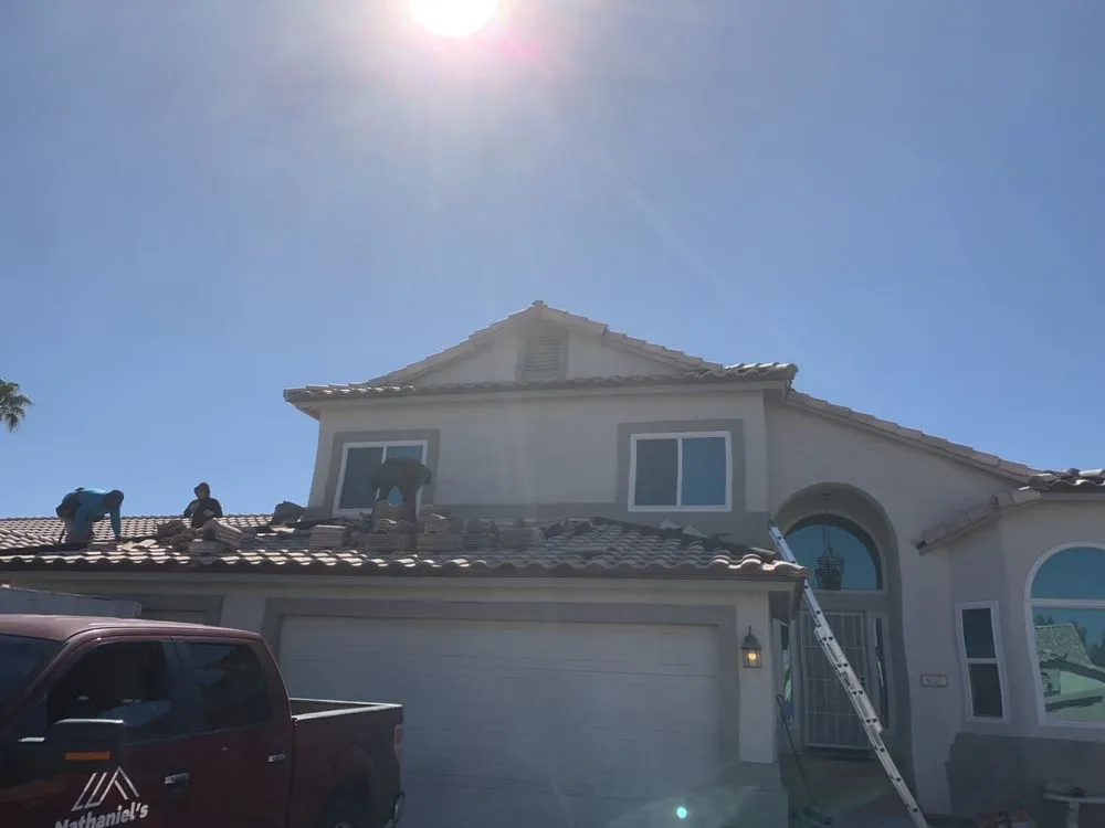 Slide of Nathaniels Roofing