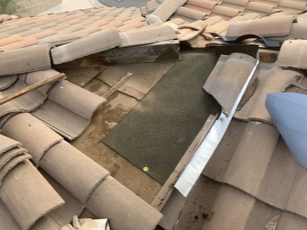 Slide of Nathaniels Roofing