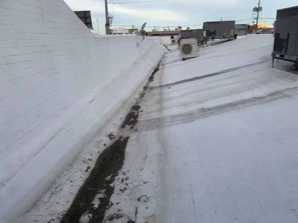 Slide of Nathaniels Roofing