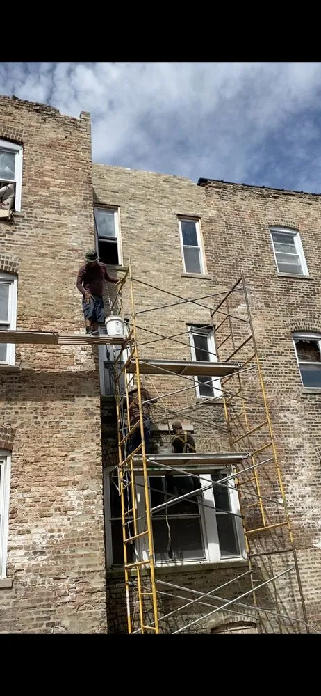 Slide of National Roofing & Tuckpointing