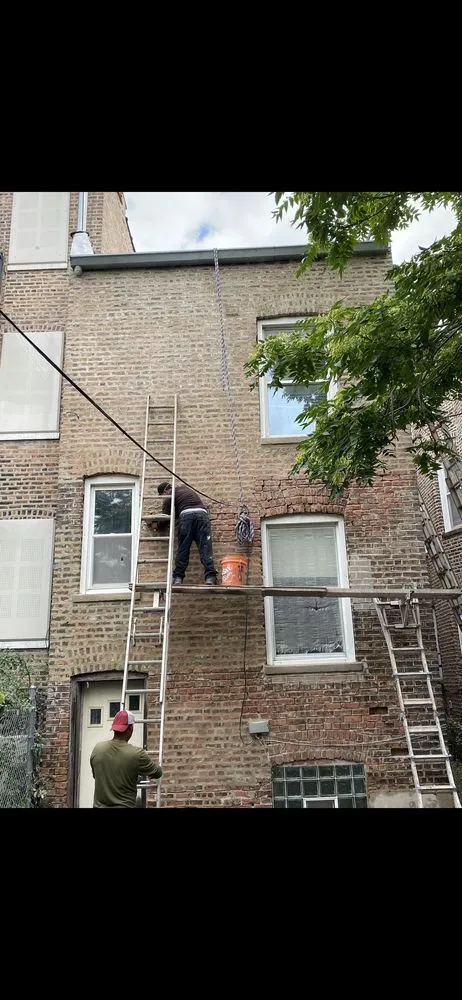 Slide of National Roofing & Tuckpointing