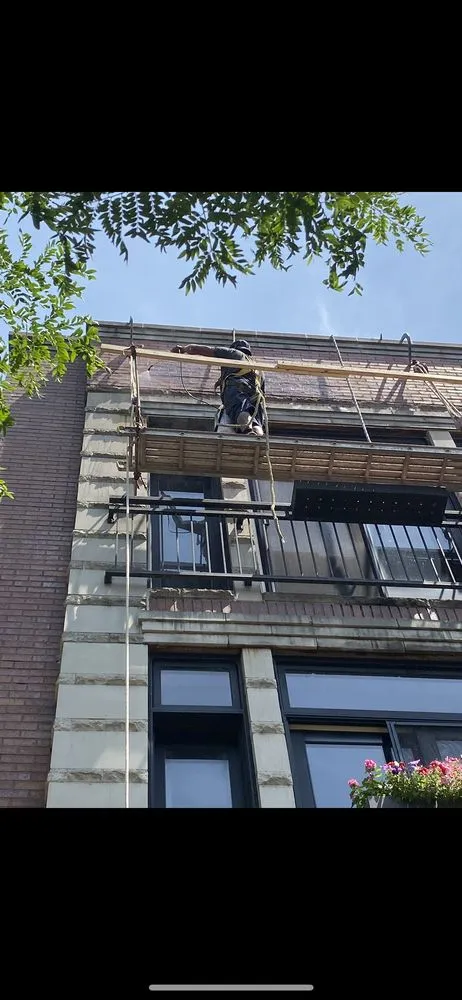 Slide of National Roofing & Tuckpointing