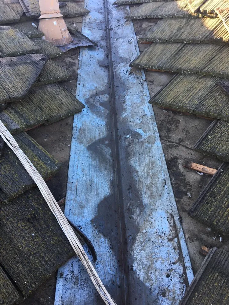 Slide of Navo Roofer & Gutters