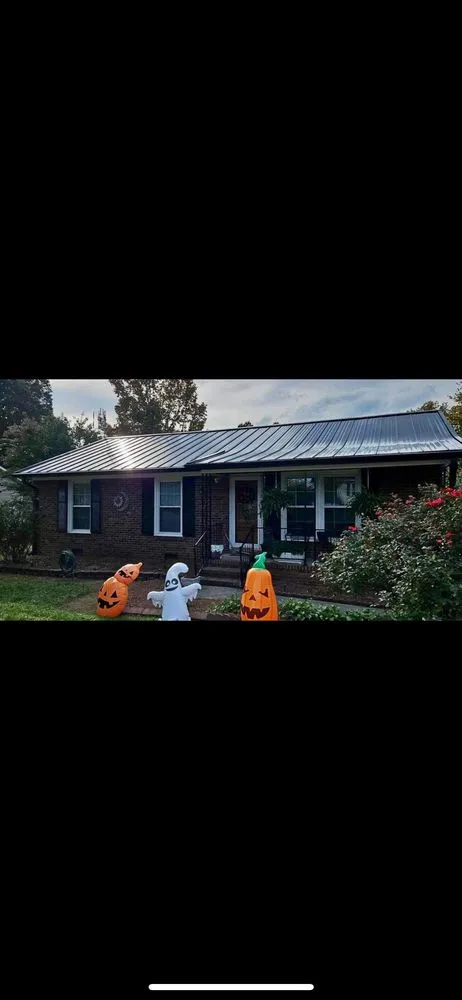 Slide of NC Gutters & Roofing