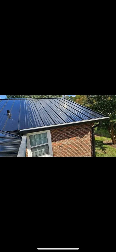 Slide of NC Gutters & Roofing
