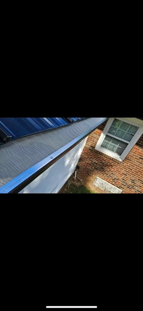 Slide of NC Gutters & Roofing