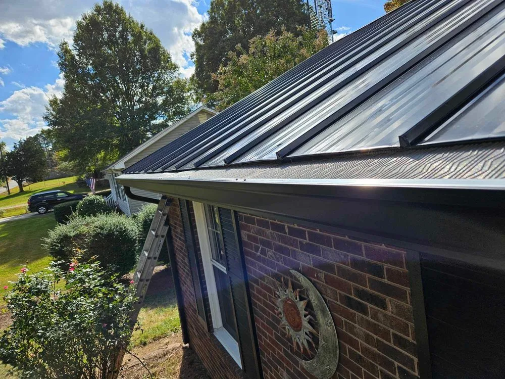 Slide of NC Gutters & Roofing