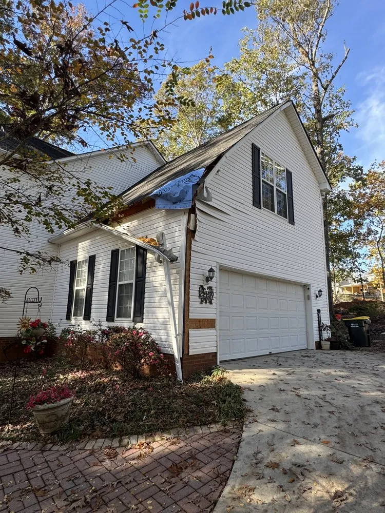 Slide of NC Top Roofing