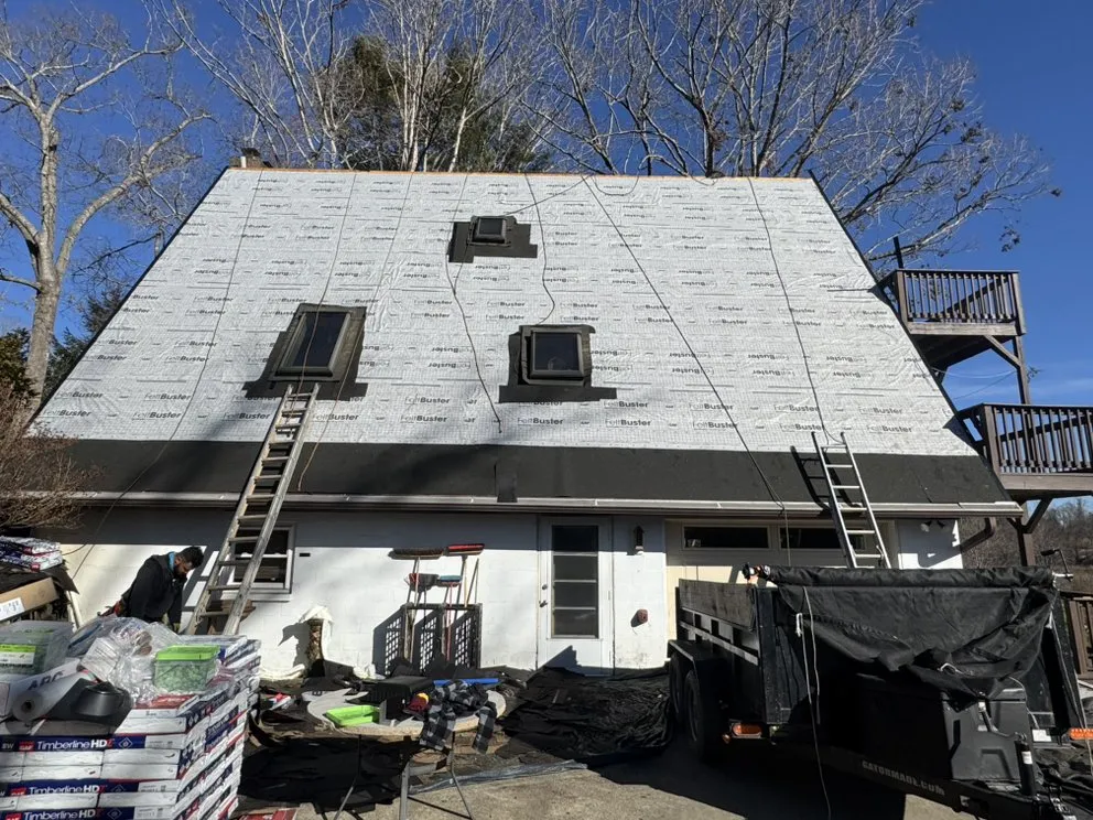 Slide of NC Top Roofing