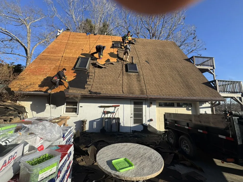 Slide of NC Top Roofing