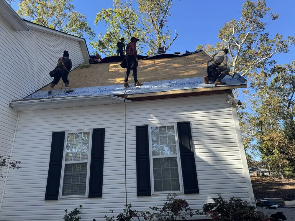 Slide of NC Top Roofing