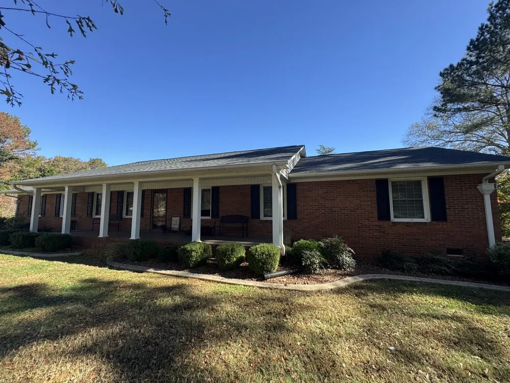 Slide of NC Top Roofing