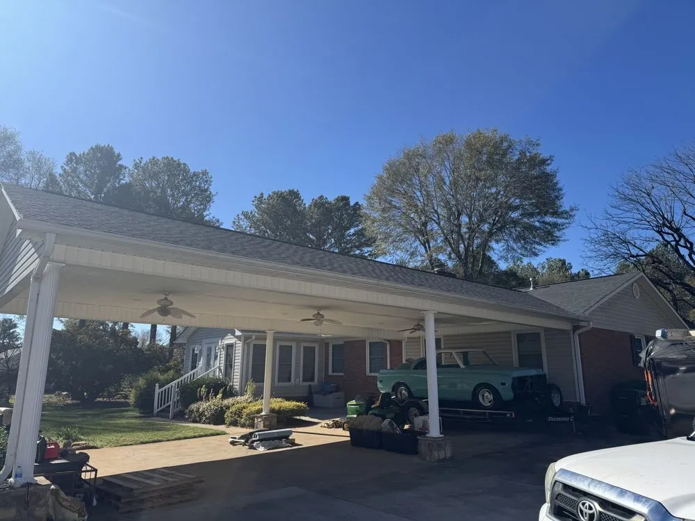 Slide of NC Top Roofing