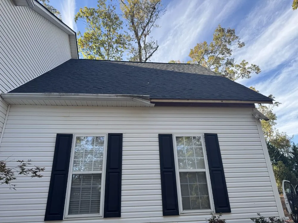 Slide of NC Top Roofing