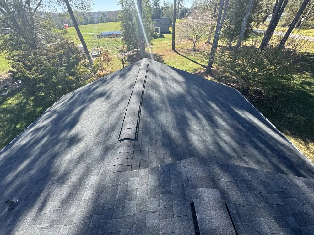 Slide of NC Top Roofing