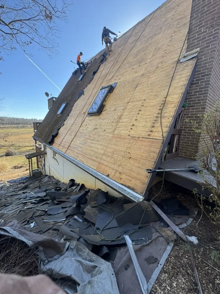 Slide of NC Top Roofing