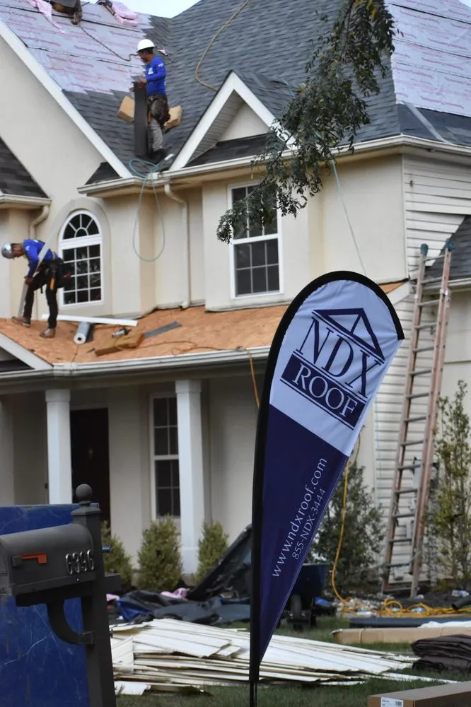 Slide of NDX Roofing and Restoration