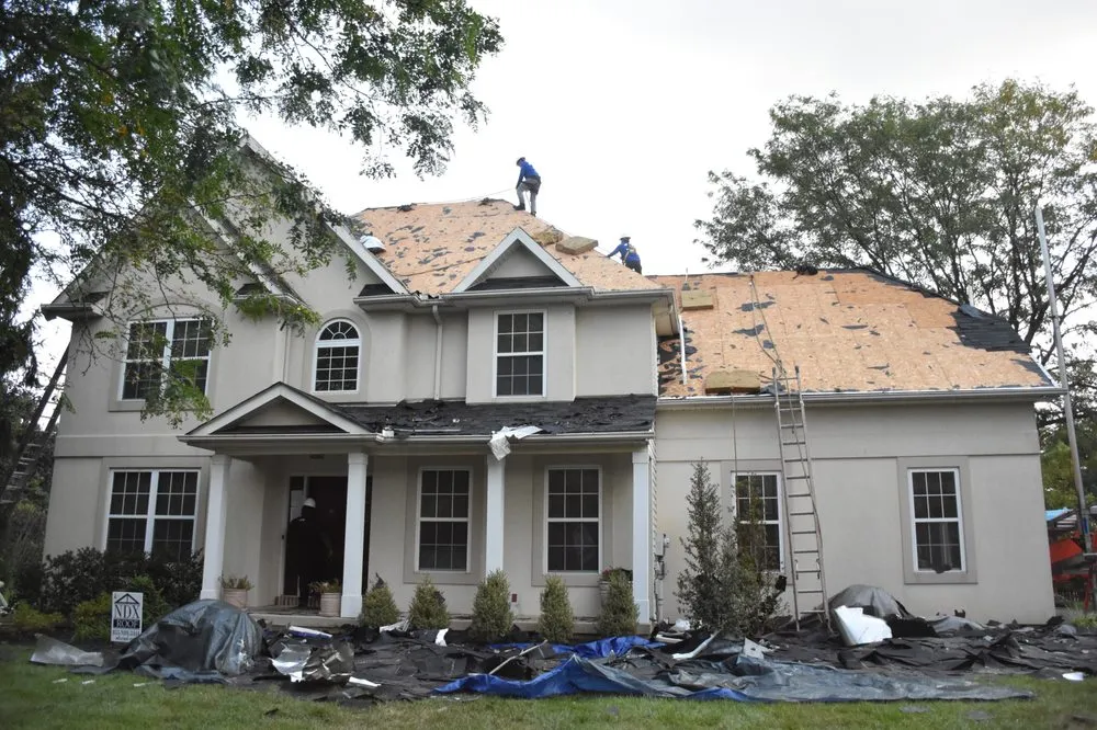 Slide of NDX Roofing and Restoration