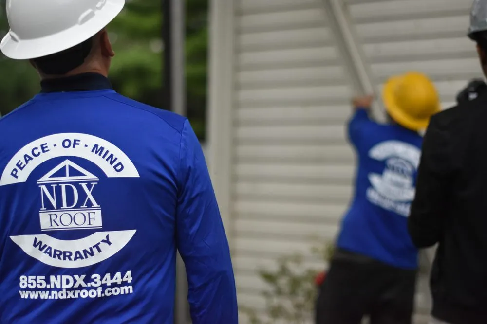 Slide of NDX Roofing and Restoration