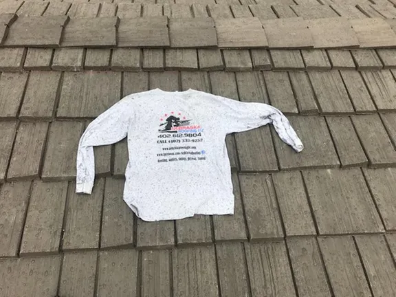 Slide of Nebraska Roofing