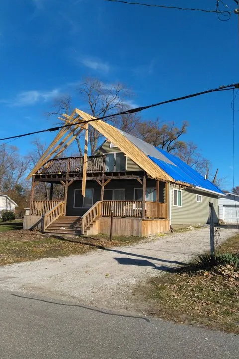 Slide of Neil's Roofing