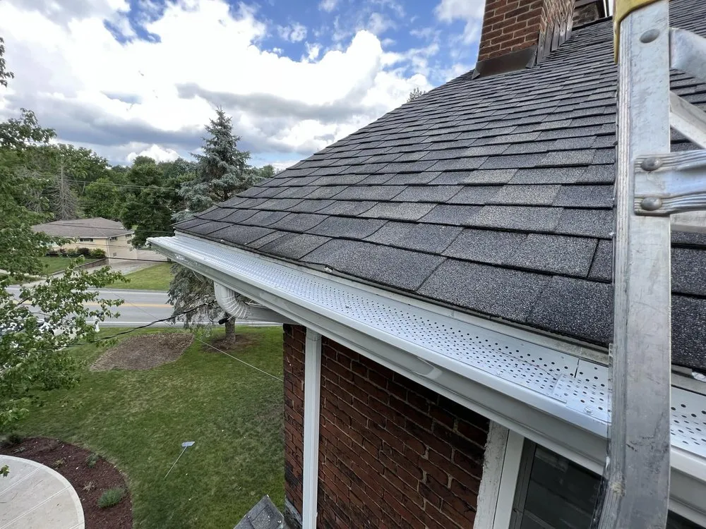 Slide of Nest Roofing & Gutters