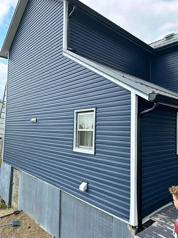 Slide of Nest Roofing & Gutters