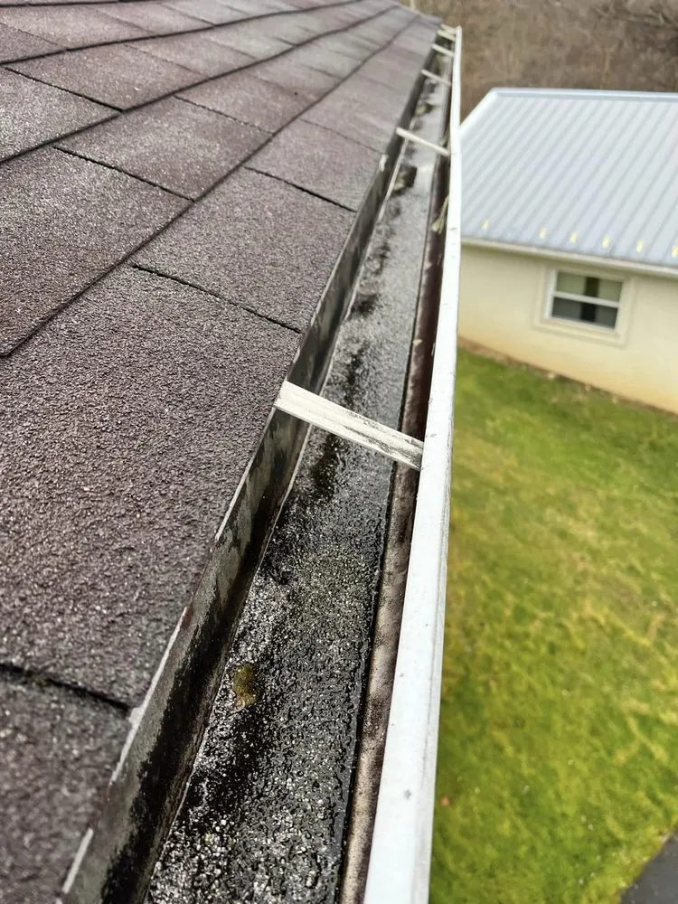 Slide of Nest Roofing & Gutters