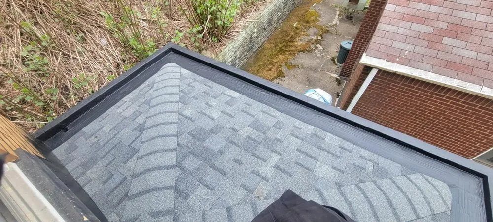 Slide of Nest Roofing & Gutters