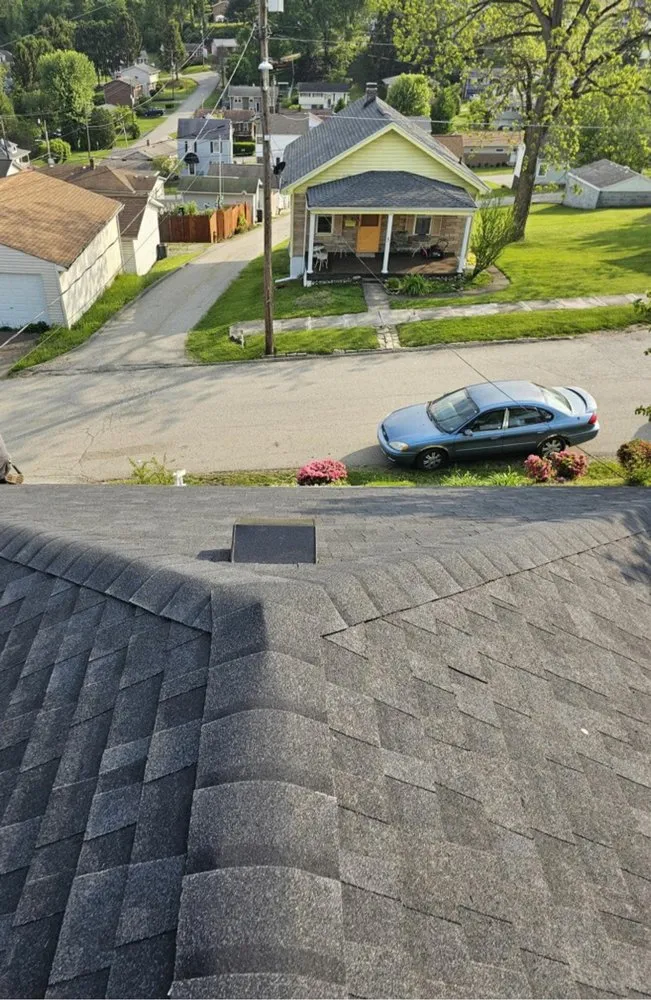 Slide of Nest Roofing & Gutters