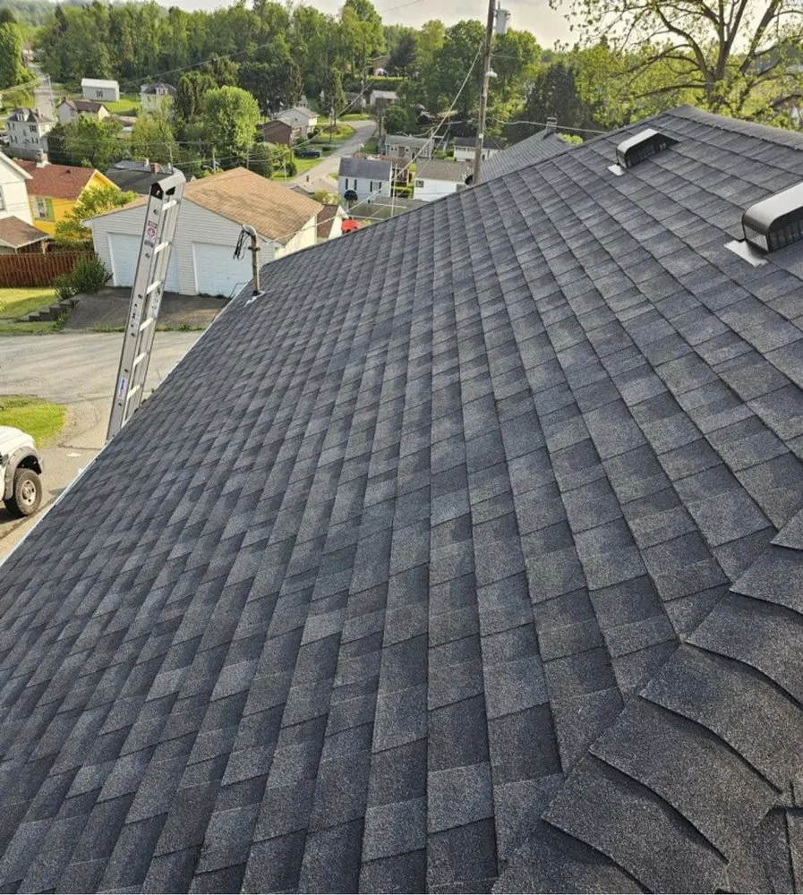 Slide of Nest Roofing & Gutters