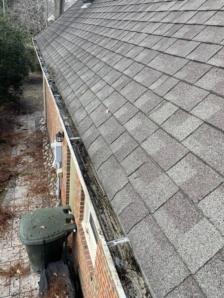 Slide of New Again Gutter Blowout And Roof Debris Service