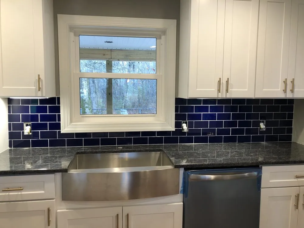 Slide of New Age Construction + Design