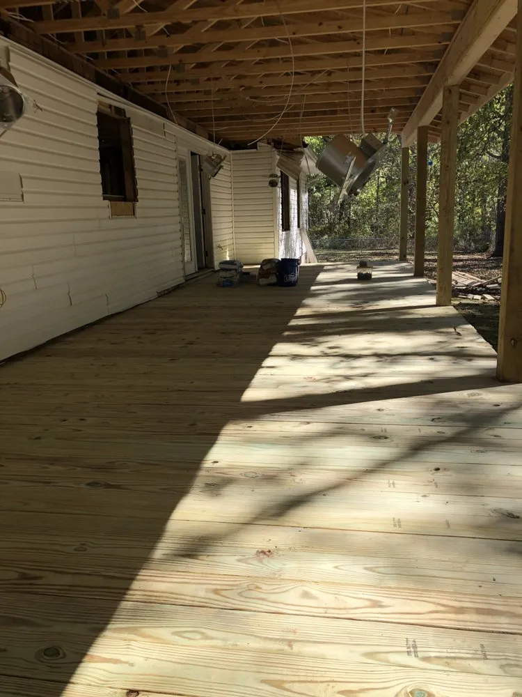 Slide of New Age Construction + Design