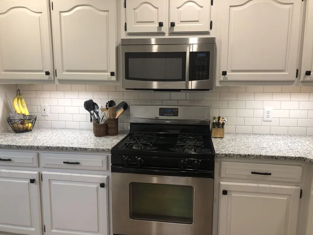 Slide of New Age Construction + Design