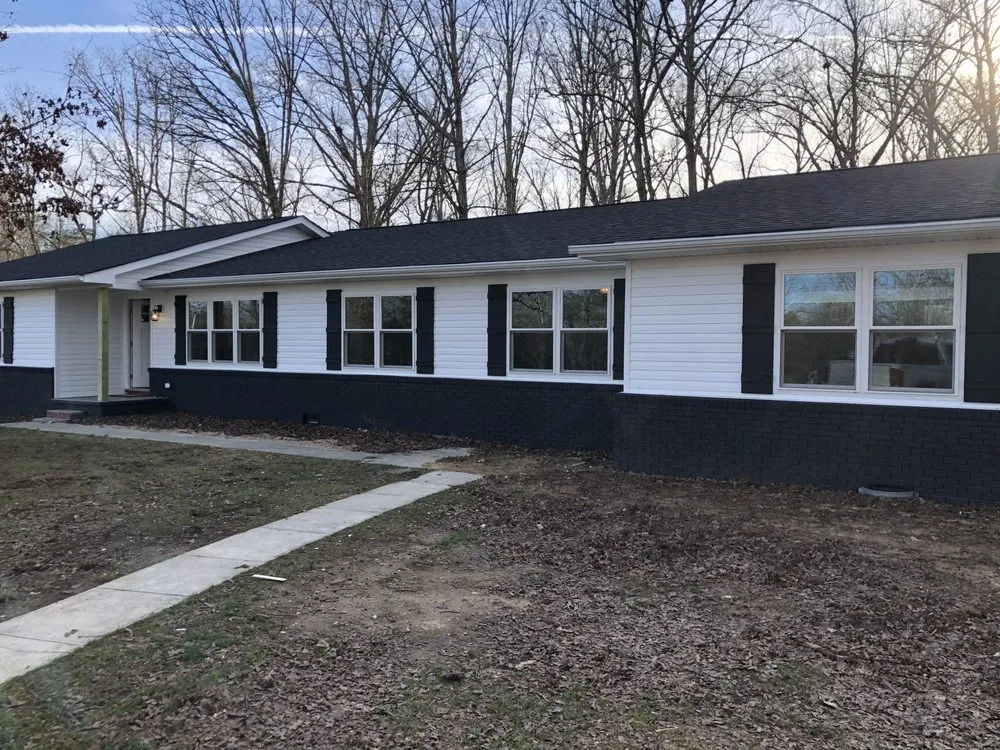 Slide of New Age Construction + Design